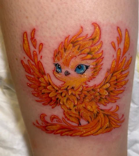 Orangefarbener Phönix – Tattoo von Nancy